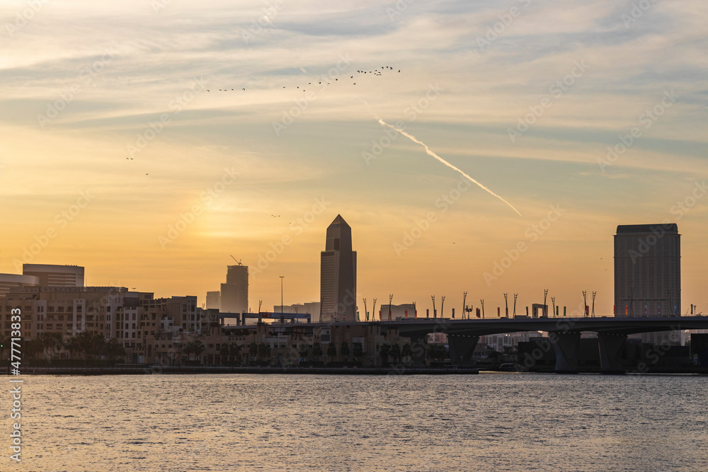Obraz premium Dubai, UAE - 12.20.2021 Cityscape at the sunset. City