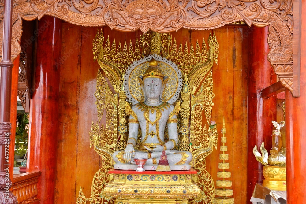 Antique sculpture statue near the big golden pagoda Wat PhraThat Doi Suthep, Chiang Mai Province, Thailand.