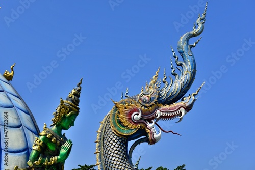 Naga Sculpture with Blue sky at Wat Rong Sua Ten  Blue temple   Chiangrai Thailand.