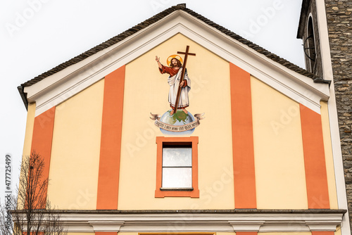 Facade of the catholic Church of Saints Rocco and Sebastiano in Gorduno, district of Bellinzona, Ticino, Switzerland.