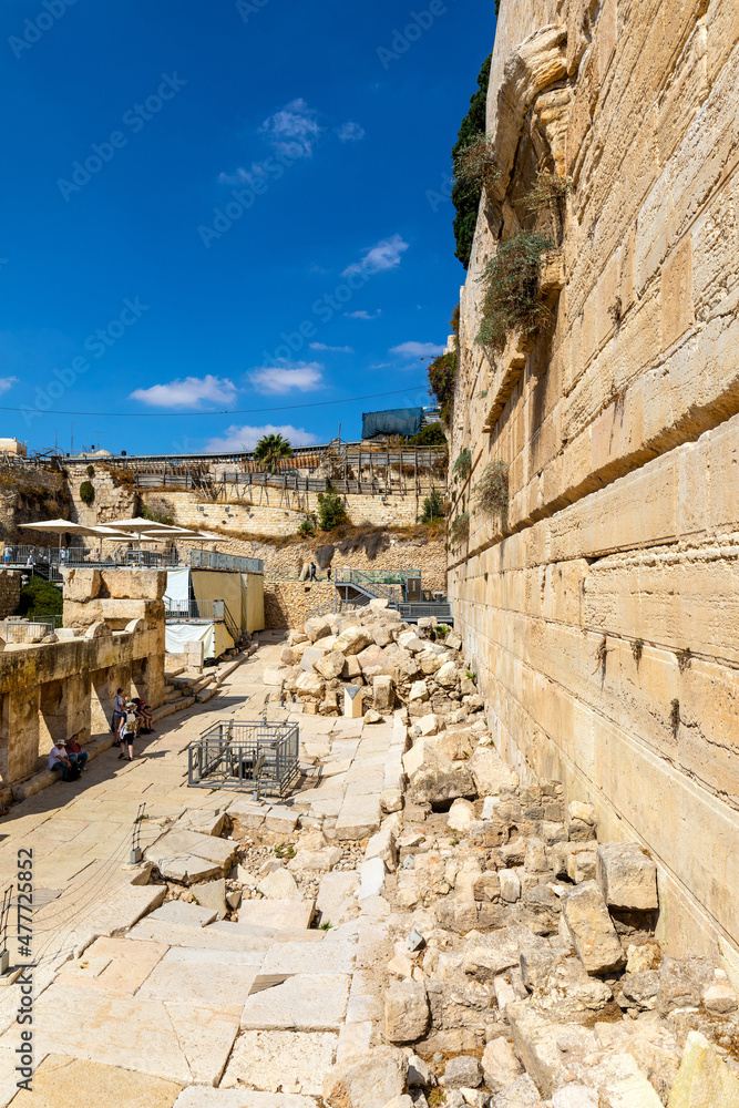 South-eastern corner of Temple Mount walls with Robinson’s Arch and Davidson Center excavation archeological park in Jerusalem Old City in Israel
