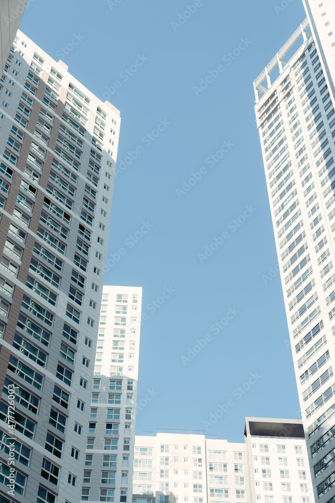 The blue sky seen through the skyscrapers.