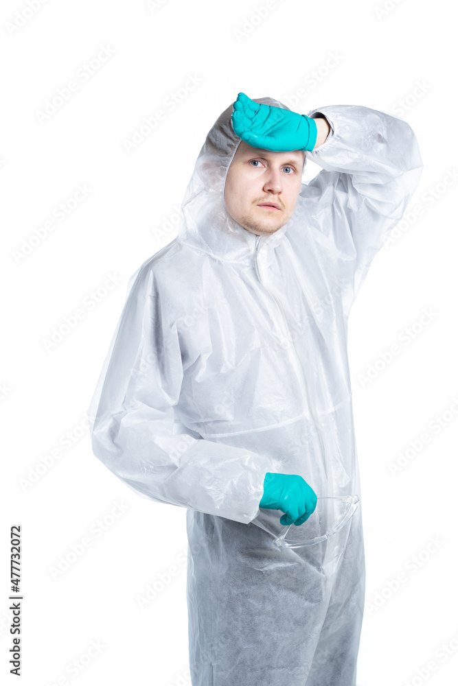 Scientist biochemist is virally tired of work. Coronovirus, flu, ebola and other diseases in the midst of an epidemic. Separate on a white background. Scientist biochemist is virally tired of work. Coronovirus, flu, ebola and other diseases in the midst of an epidemic. Separate on a white background.
