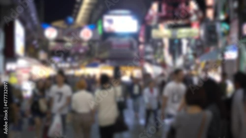 Wallpaper Mural Blurred defocused view of asian people in entrace of street at Tokyo Ameyoko market in evening. Busy street for shopping in japanese stores. Japan Torontodigital.ca