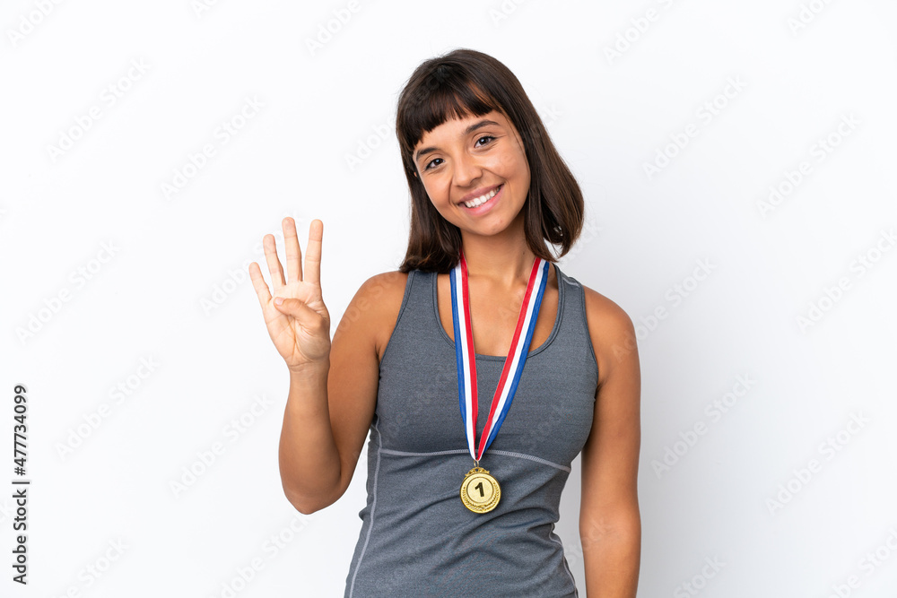Young mixed race woman with medals isolated on white background happy and counting four with fingers Young mixed race woman with medals isolated on white background happy and counting four with fingers