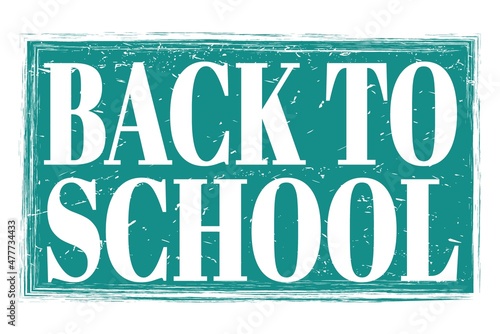 BACK TO SCHOOL  words on blue grungy stamp sign