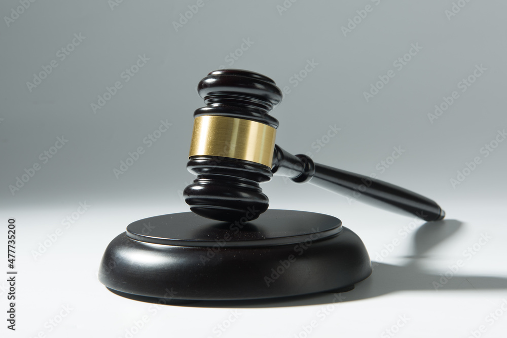 a judge's gavel on white background. a judge's gavel on white background.