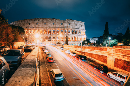 Rome, Italy. Colosseum Also Known As Flavian Amphitheatre In Evening Or Night Time.