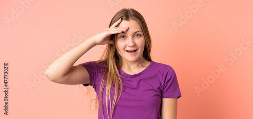 Teenager Ukrainian girl isolated on pink background has realized something and intending the solution