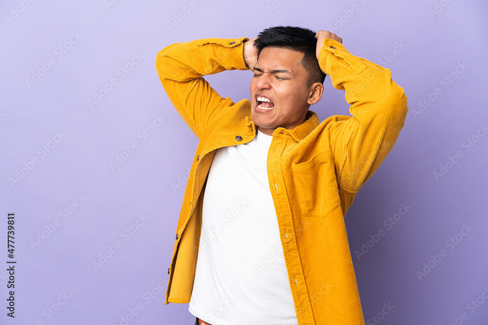 Young Ecuadorian man isolated on purple background stressed overwhelmed Young Ecuadorian man isolated on purple background stressed overwhelmed