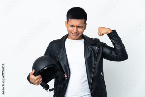 Ecudorian man with a motorcycle helmet isolated on white background doing strong gesture
