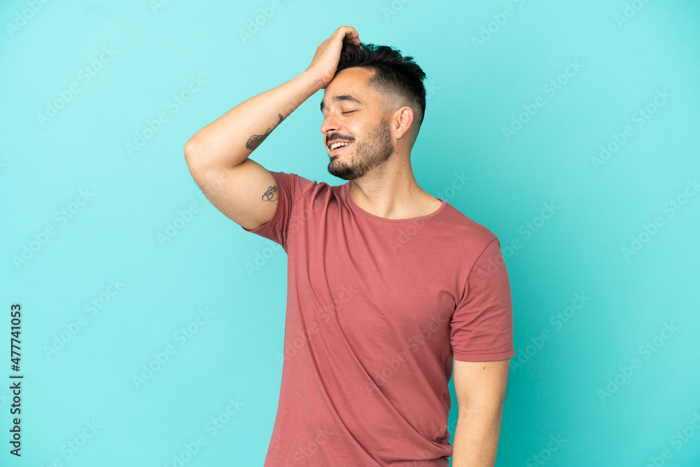 Young caucasian man isolated on blue background has realized something and intending the solution Young caucasian man isolated on blue background has realized something and intending the solution