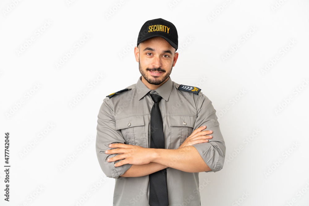 Young security caucasian man isolated on white background keeping the arms crossed in frontal position Young security caucasian man isolated on white background keeping the arms crossed in frontal position