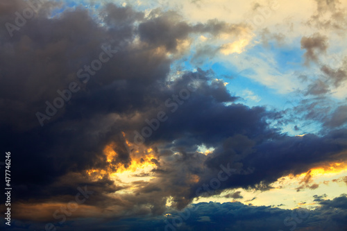 Light beam with dark clouds . Fantastic evening heaven 
