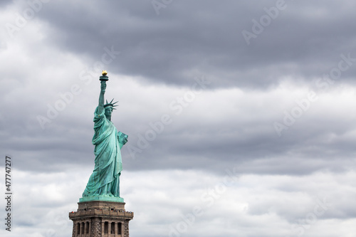 Statue of Liberty on a cloudy day as background image  New York City  USA