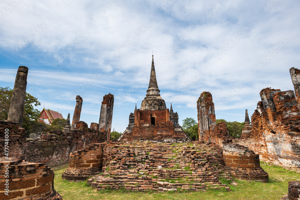 Wat Phra Sri Sanphet Temple site, ruins of majestic royal palace temple with 3 restored towers in the old capital of Thailand, Ayutthaya. Wat Phra Sri Sanphet Temple site, ruins of majestic royal palace temple with 3 restored towers in the old capital of Thailand, Ayutthaya.