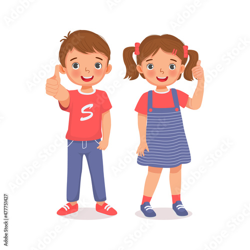Happy little boy and girl giving thumbs up gestures with positive facial expression. Kids showing liking, approval and sign of success.