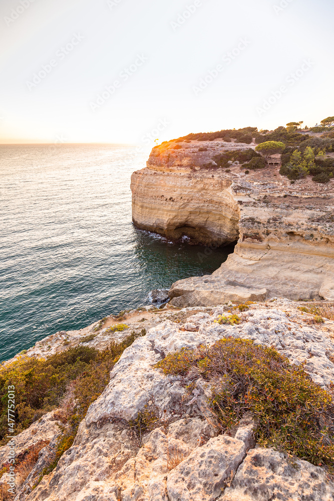 Stone cliffs and turquoise water at Algarve