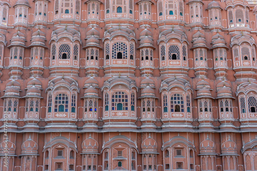 Hawa Mahal, pink palace of winds in old city Jaipur, Rajasthan, India. Background of indian architecture