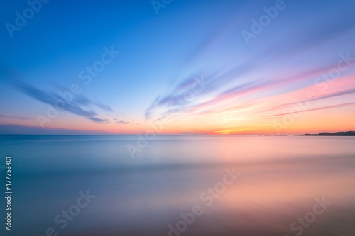 Tranquil Sunrise Sunset Long Exposure over water with beautiful gentle colors. © Scott Masterton