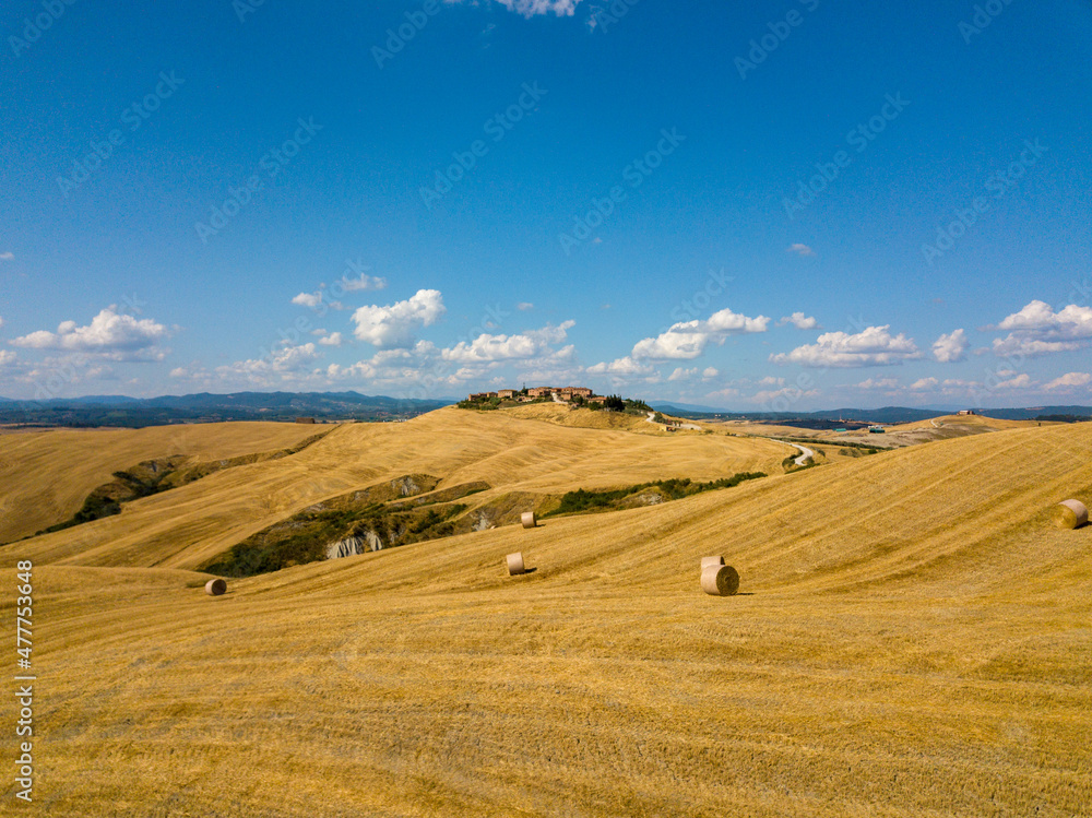 Drone Aerial beautiful tuscany countryside landscape with medieval village town in Tuscany. South of Siena, Italy