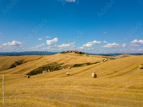Drone Aerial beautiful tuscany countryside landscape with medieval village town in Tuscany. South of Siena, Italy