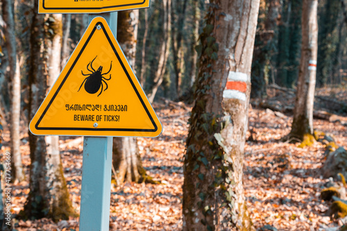 sign of danger for ticks, in the middle of the forest