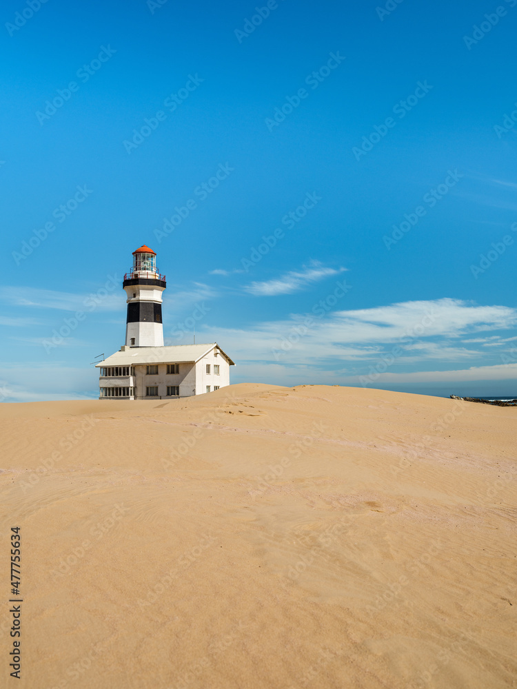 Cape Recife Lighthouse and sand dunes on a clear summer day in Port Elizabeth Gqeberha South Africa