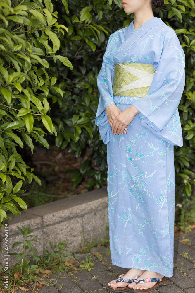 Woman in Japanese traditional fashion Woman in Japanese traditional fashion