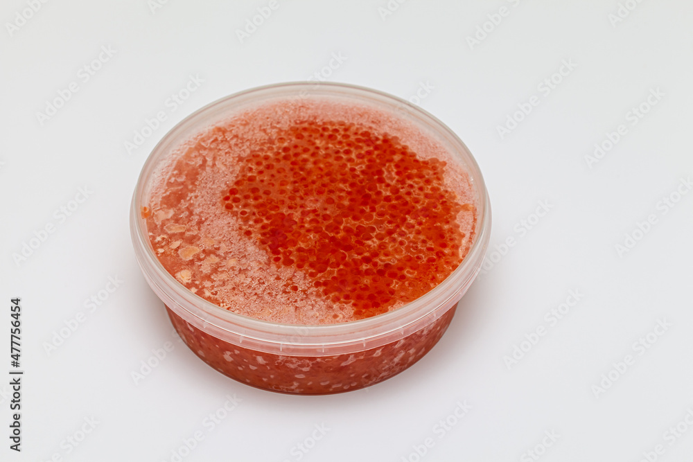 closed plastic jar with natural frozen caviar closed plastic jar with natural frozen caviar