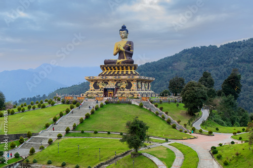 Beautiful huge statue of Lord Buddha  at Rabangla   Sikkim   India. Surrounded by Himalayan Mountains. It is called Buddha Park - a popular tourist attraction.