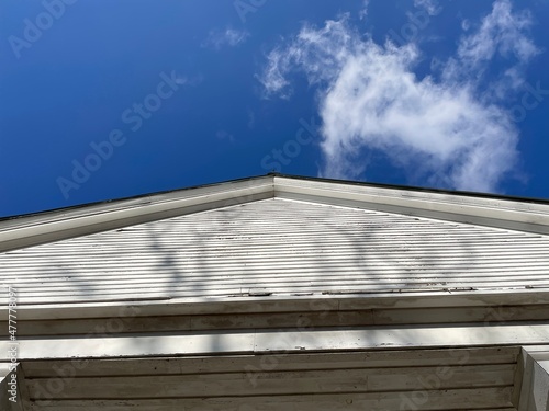 Bark Camp Church historic vintage southern baptist church clouds and roof top photo