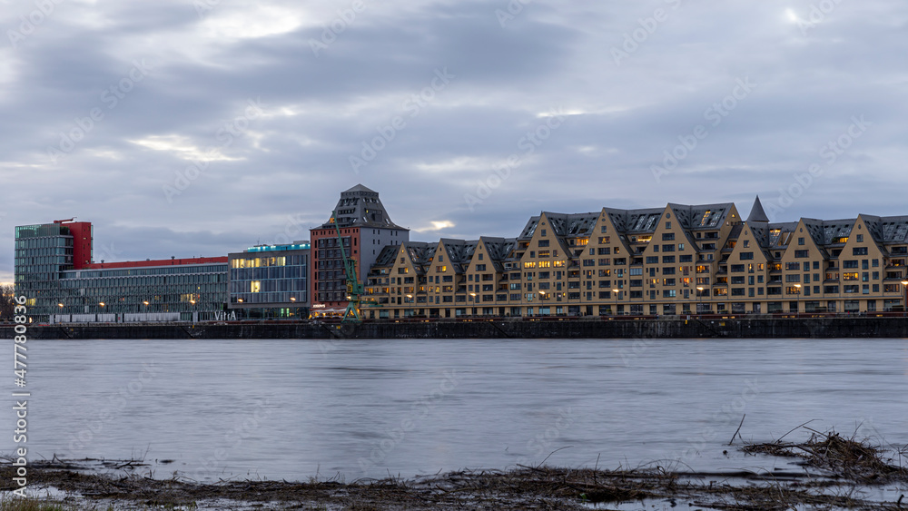 Modern buildings on river banks of Rhine river in Cologne