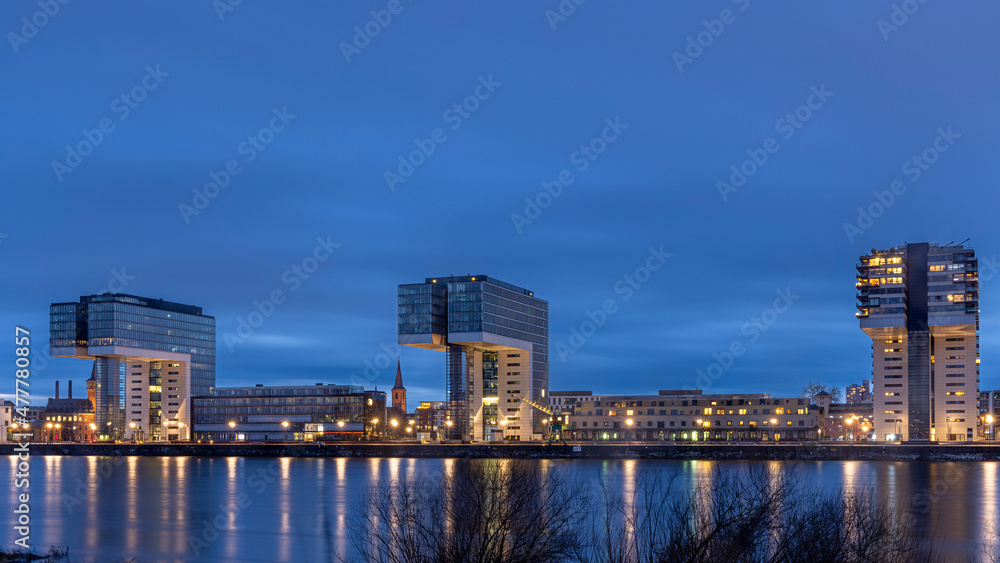 Naklejka premium Modern skyscraper standing near Rhine river in Cologne, Germany