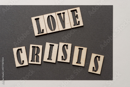 the expression "love crisis" on paper