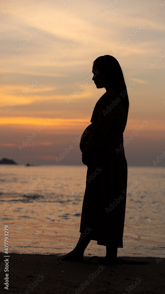 silhouette of a person sitting on a bench, sunset over the river, Patong beach