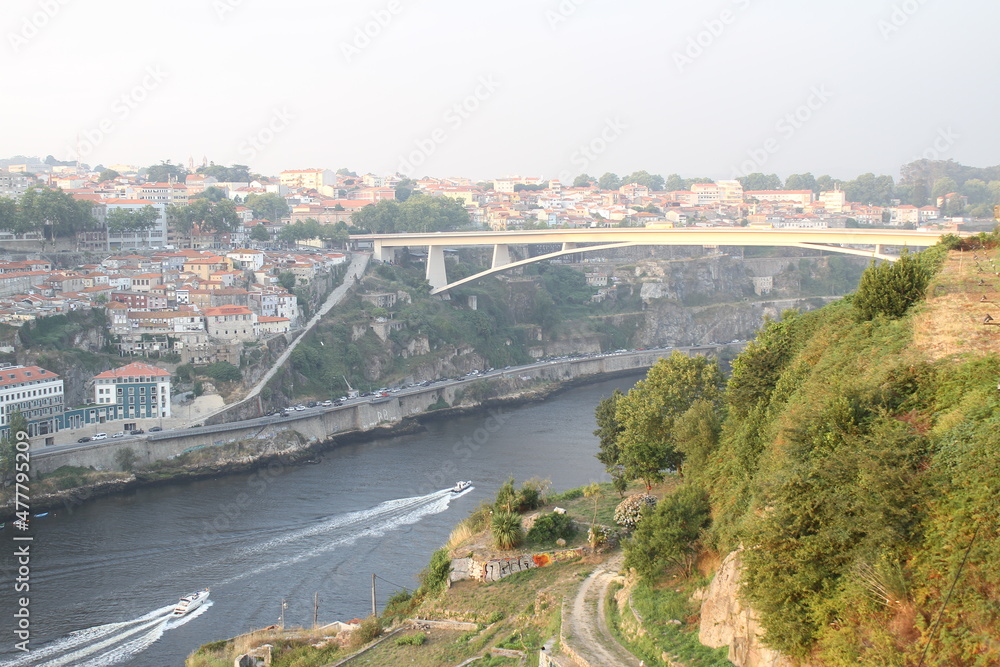 View of Porto Oporto city with Infante Dom Henrique Bridge ponte across Douro River in Portugal.