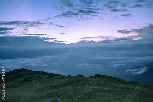 Aerial sunset view over the Blue Ridge Mountains from khaliya top, Munsiyari, India. Sky with clouds photo