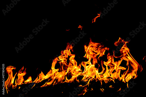 Blaze burning fire flame on art texture background.