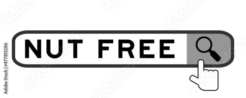 Search banner in word nut free with hand over magnifier icon on white background
