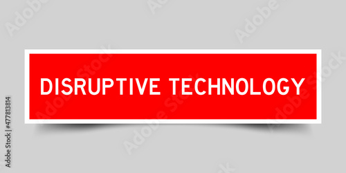 Sticker label with word disruptive technology in red color on gray background
