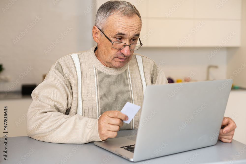 Senior Adult Holding Credit Card Concept Senior Adult Holding Credit Card Concept