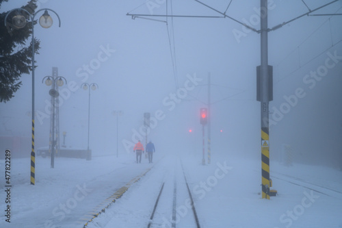 Dark winter on the railway station  © kovop58