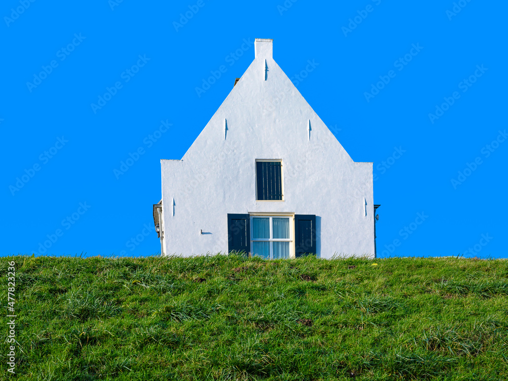 HISTORICAL house on the dike along the river IJssel near Welsum, Overijssel province, The Netherlands HISTORICAL house on the dike along the river IJssel near Welsum, Overijssel province, The Netherlands