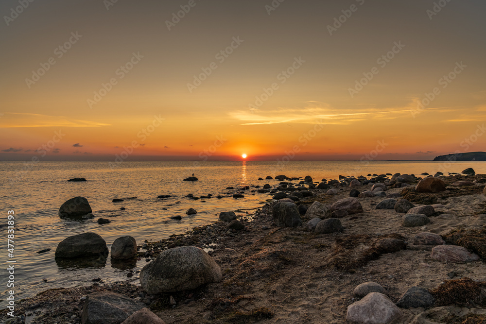 Sunset over Baltic Sea, seen from Klein Zicker, Mecklenburg-Western Pomerania, Germany Sunset over Baltic Sea, seen from Klein Zicker, Mecklenburg-Western Pomerania, Germany