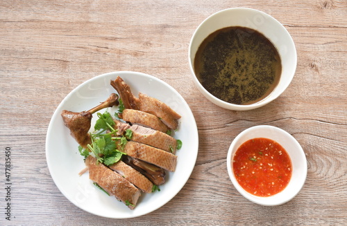 boiled duck meat in black soybean sauce dipping spicy chili sauce