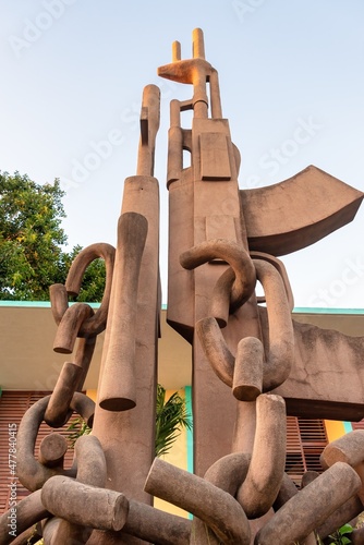 Foto Sculpture of AKMs and Chains in the Communist Party Headquarters in Las Tunas, C