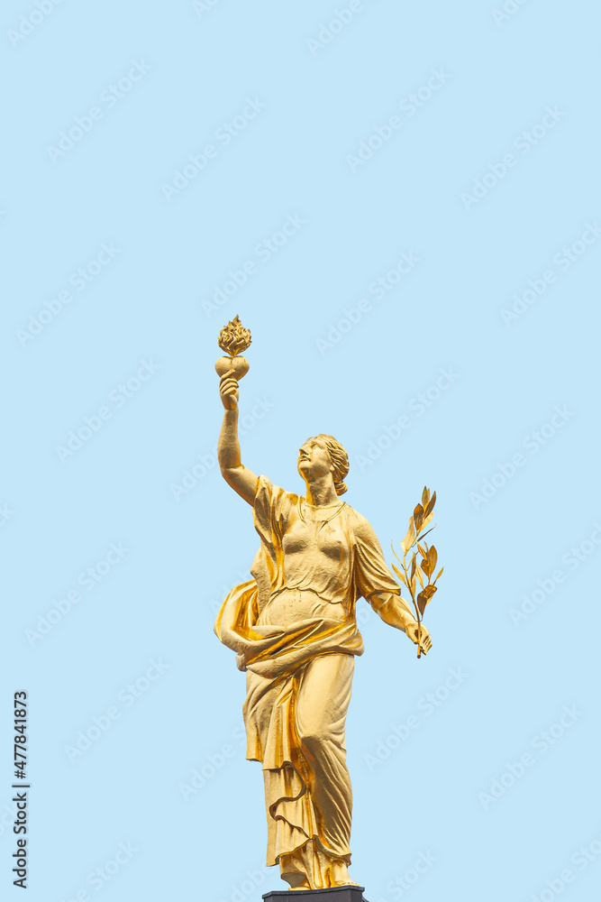 Cover page with a golden statue of Greek goddess of peace Eirene, Pax, with heart and laurel branch in her hands, symbols of love and peace, at blue sky solid background with copy space.