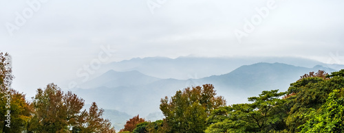 Chinese style blue and black mountains in Shimen National Forest Park, guangzhou, guangdong, China.    Rolling hills