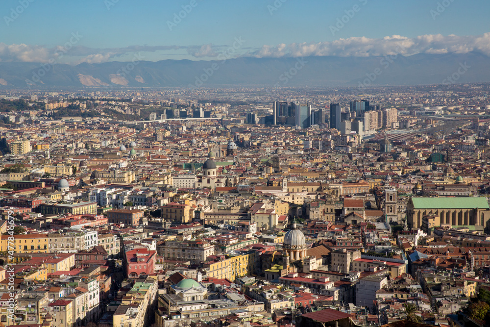 Panoramic view of the city of Naples from Vomero. The city extends up to the directional center, where the skyscrapers are, and Capodimonte park.